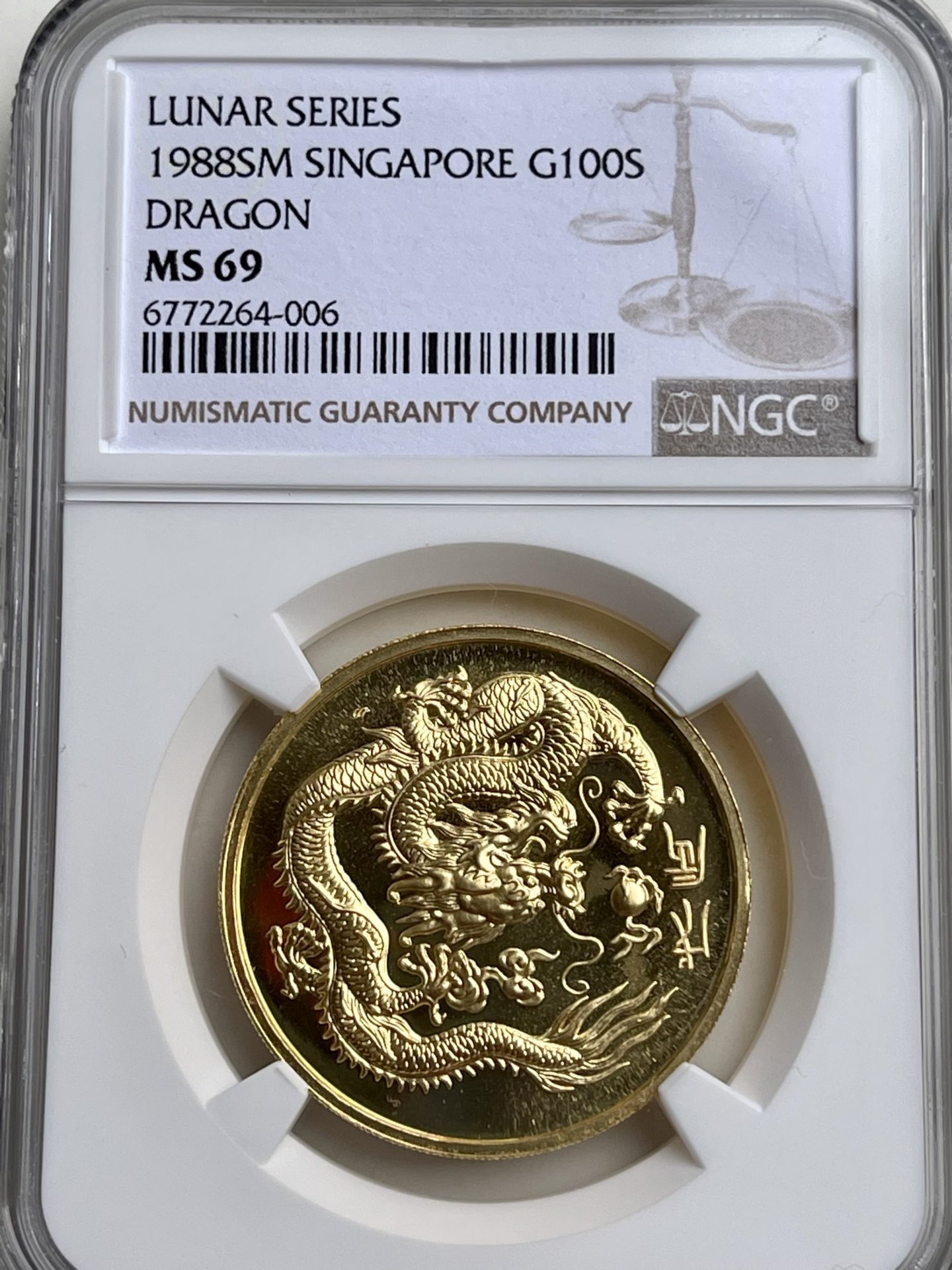 Singapur year of the dragon 100 singold 1988 ngc ms69