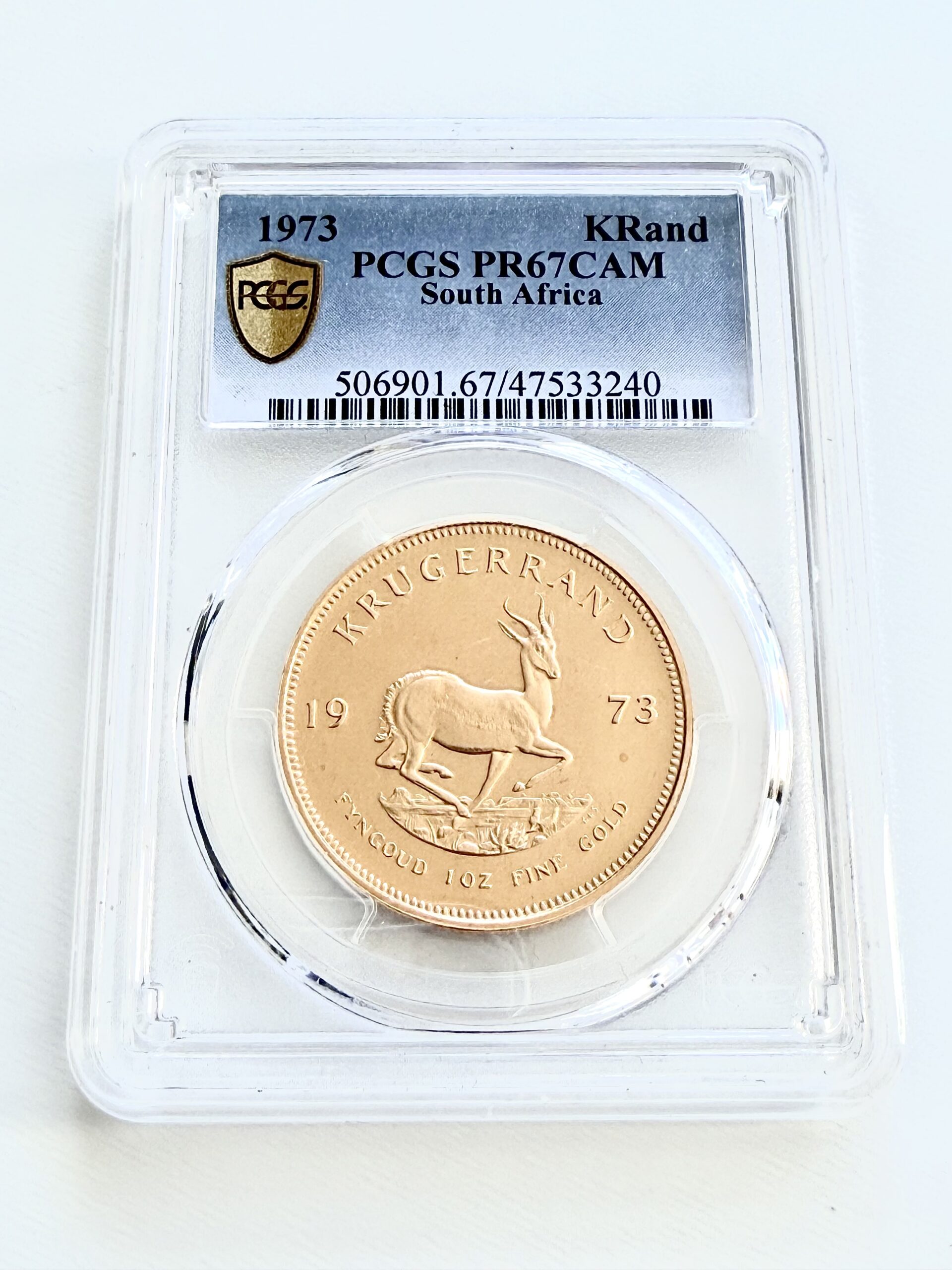 kruegerrand–1973–1oz-gold-pcgs-pr67-cam_1 Krugerrand 1973 1 oz Goldmünze in Proof, PCGS PR67 CAM – zertifizierte südafrikanische Sammlermünze mit klassischem Springbock-Design