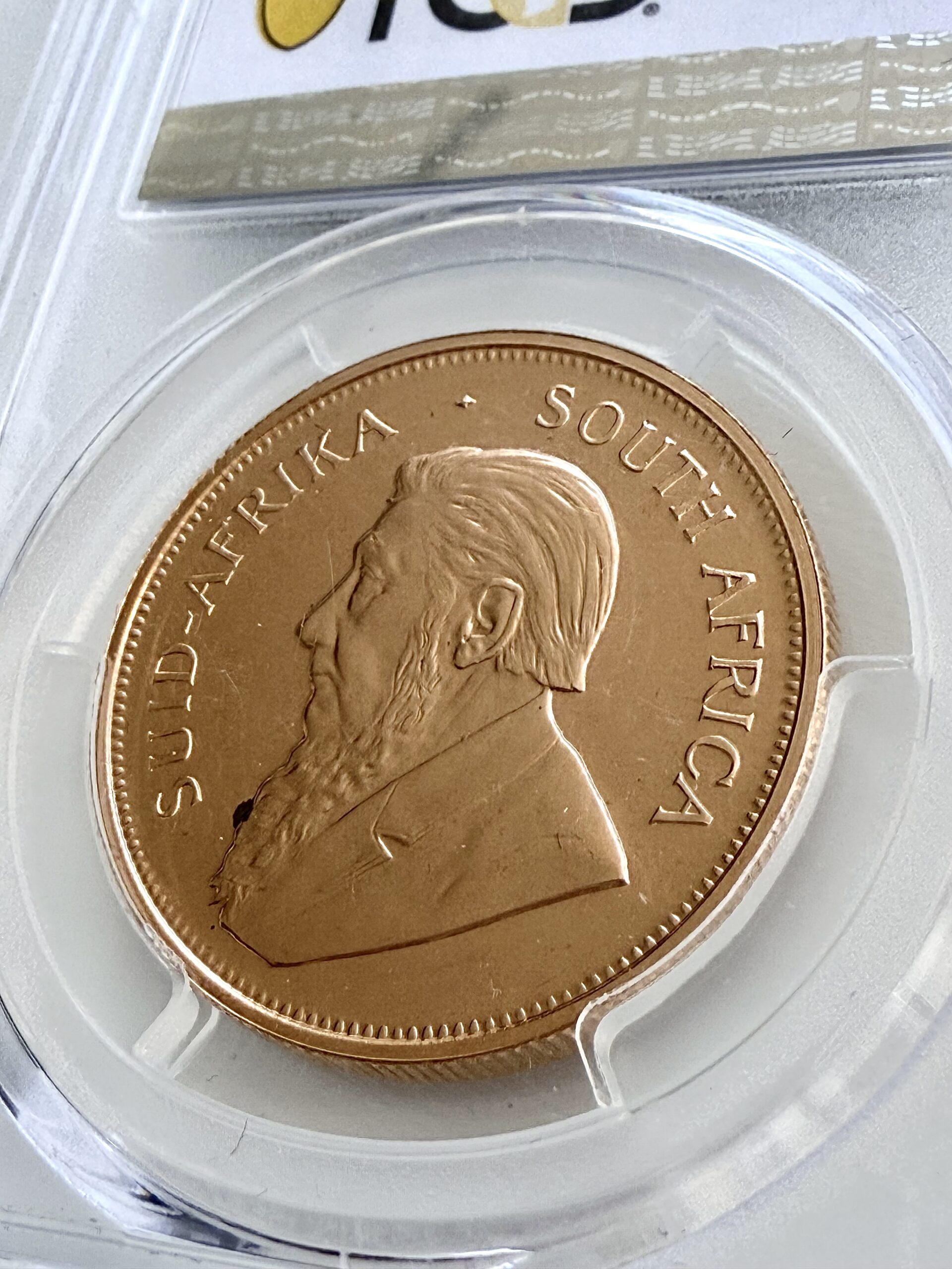 kruegerrand–1973–1oz-gold-pcgs-pr67-cam_4 Krugerrand 1973 1 oz Goldmünze in Proof, PCGS PR67 CAM – zertifizierte südafrikanische Sammlermünze mit klassischem Springbock-Design