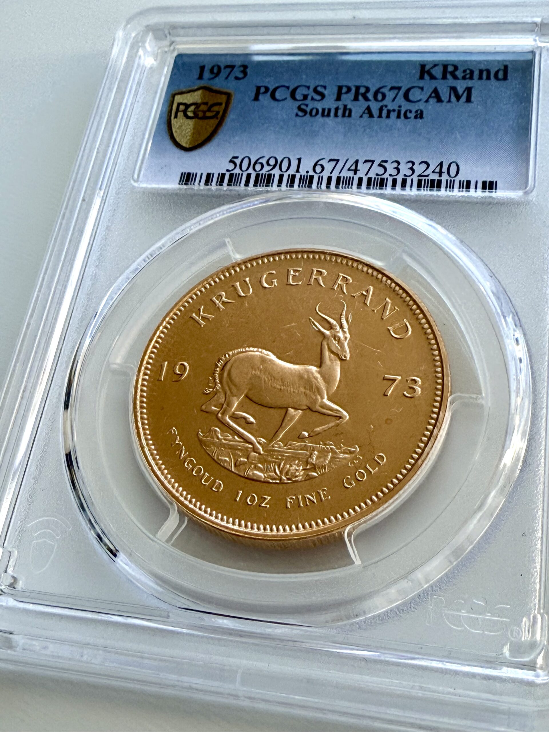 kruegerrand–1973–1oz-gold-pcgs-pr67-cam_5 Krugerrand 1973 1 oz Goldmünze in Proof-Qualität, PCGS PR67 CAM – historische südafrikanische Sammlermünze mit Paul-Kruger-Motiv