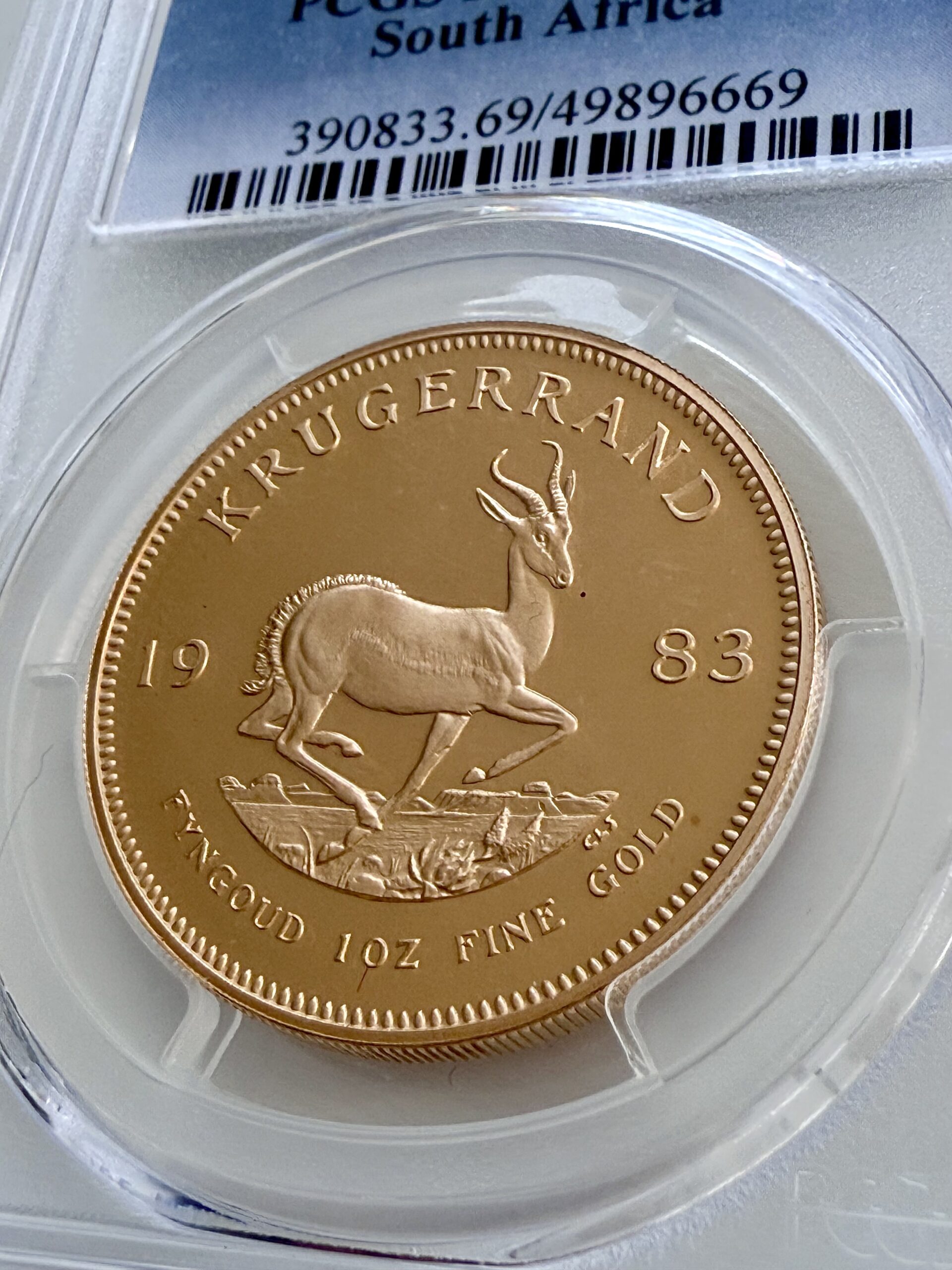 kruegerrand–1983–1oz-gold-pcgs-pr69-dcam_3 Krugerrand 1983 1 oz Goldmünze in Proof, PCGS PR69 DCAM – südafrikanische Sammlermünze mit tiefem Spiegelglanz und Springbock-Motiv