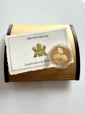 Moneda de oro canadiense de 350 dólares de 2003, trilio blanco, con estuche y certificado.