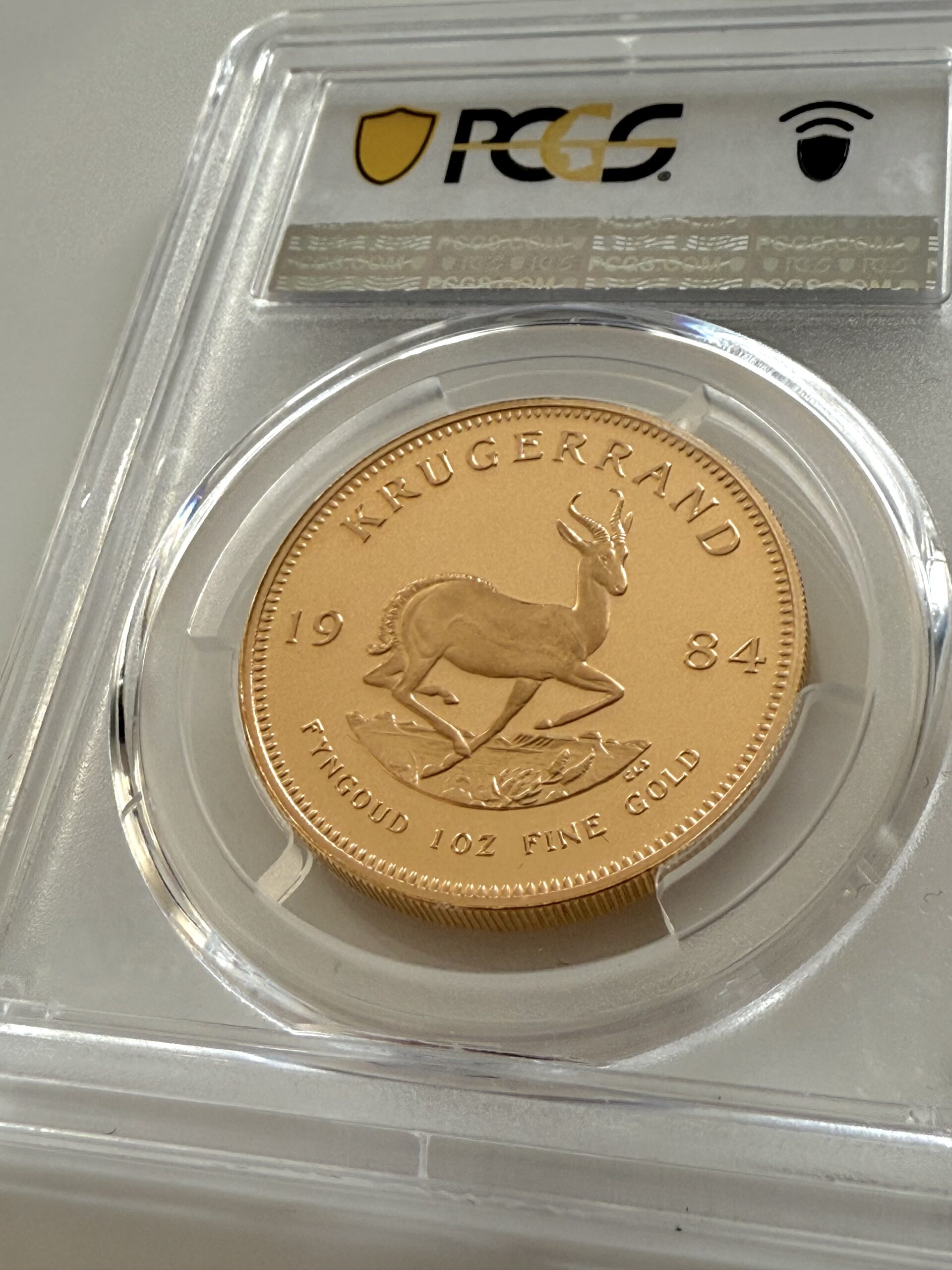 南非1984 年克鲁格兰1 盎司精铸金– PCGS PR68 DCAM
