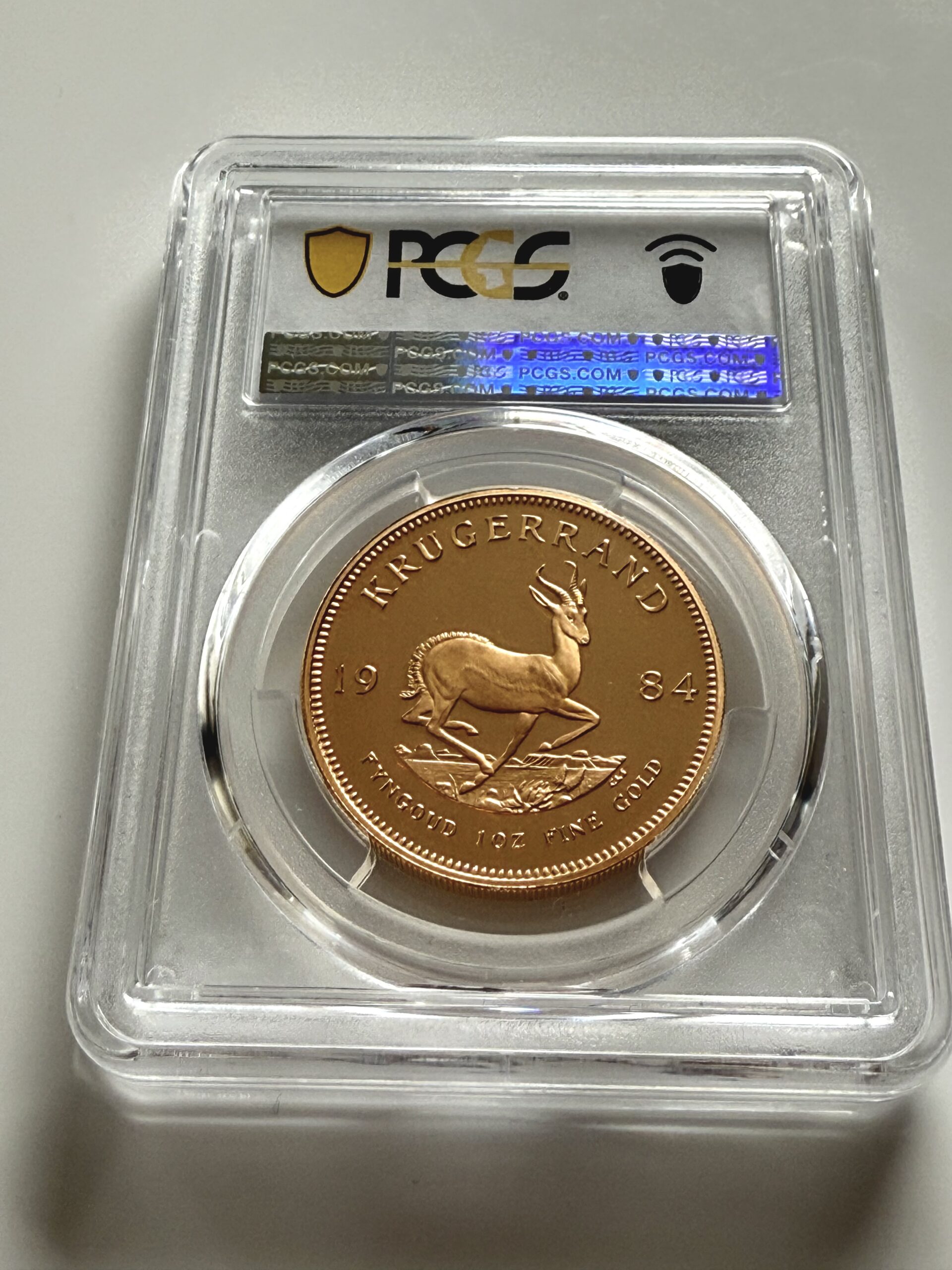 南非1984 年克鲁格兰1 盎司精铸金– PCGS PR68 DCAM