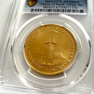South Africa 1960 Chamber of Mines “Goue Jubileum” 1 oz gold coin in PCGS slab; reverse features two springboks and the inscription “GOUE 1910–1960 JUBILEUM – UNIE VAN SUID-AFRIKA”.