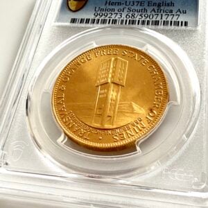 Südafrika 1960 „Chamber of Mines – Golden Jubilee“ 1 oz Gold im PCGS-Slab MS68, Schrägaufnahme mit Förderturm-Motiv