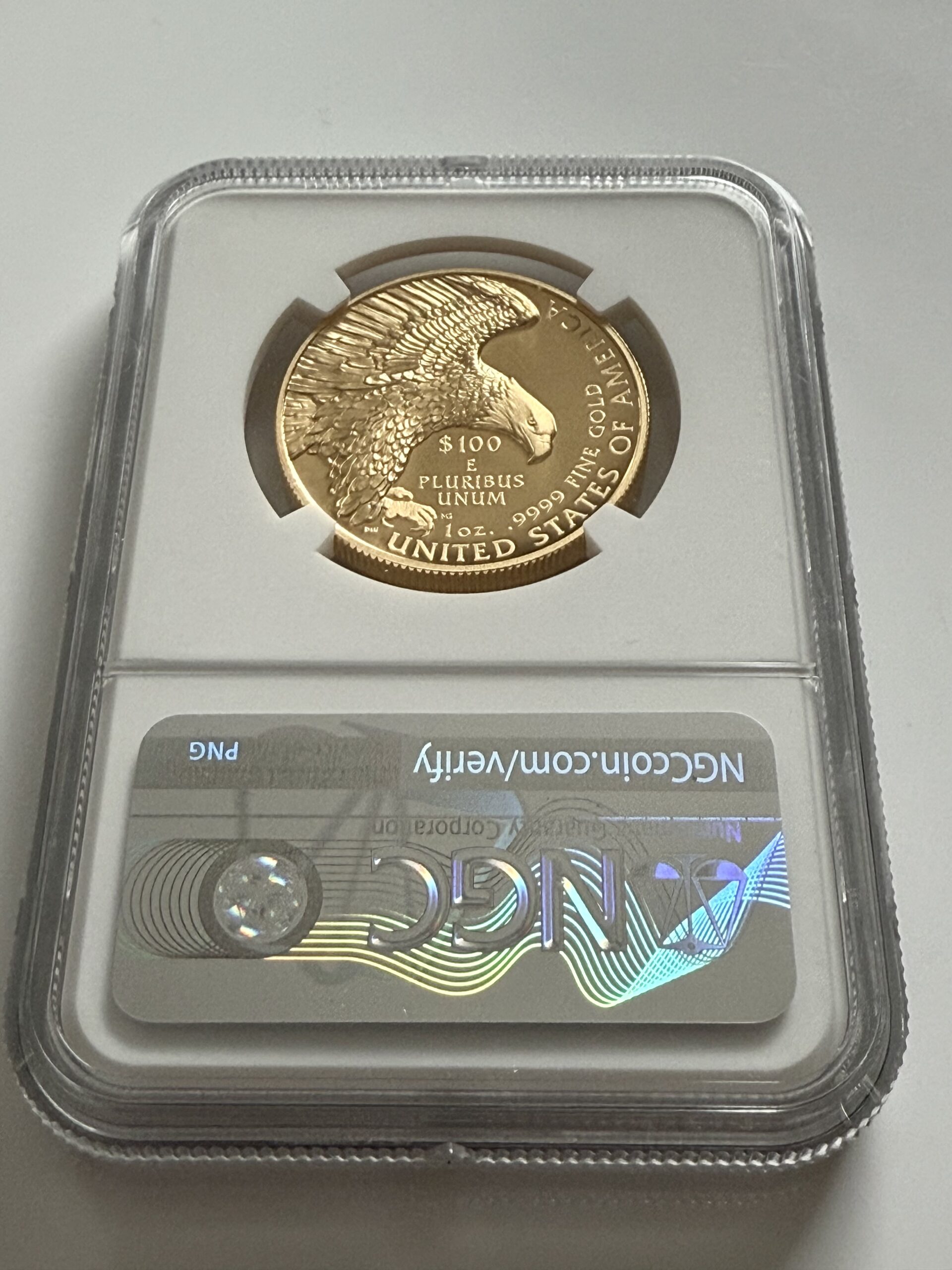 États-Unis 2019 American Liberty Haut-relief Westpoint NGC SP70 Amélioré 3 American Liberty 2019 1 oz Gold $100 High Relief - Rückseite mit Adler im Flug - NGC-Slab Detail