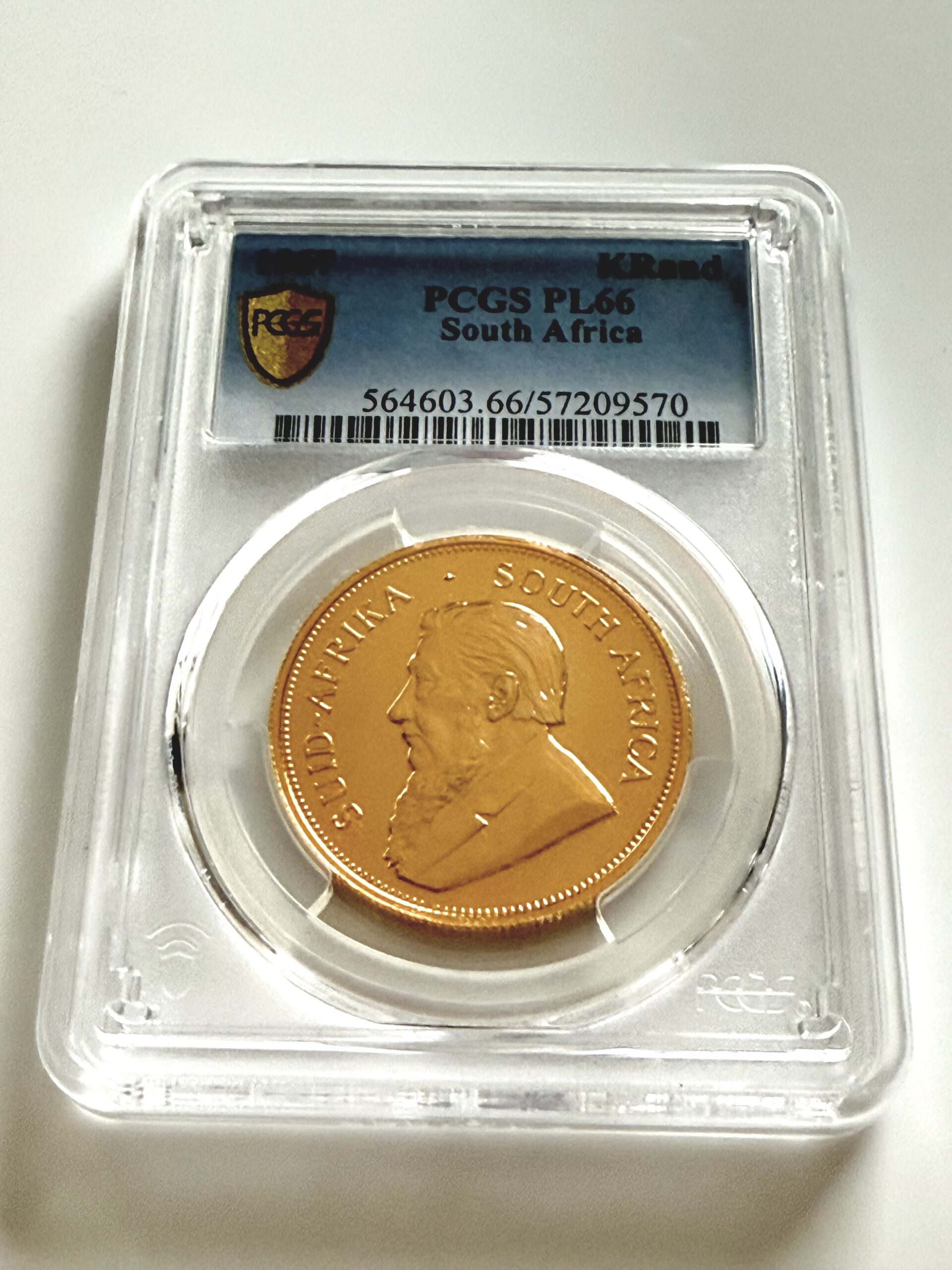 kruegerrand-1967-1oz-pcgs-pl66_4 PCGS zertifizierter Krügerrand 1967 zu 1 oz Gold, Einstufung PL66, Vorderseite im Original PCGS Holder.