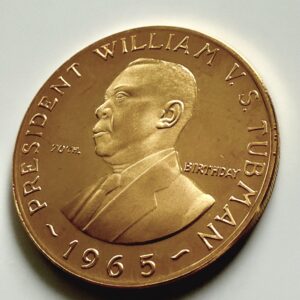 Золотая монета Либерия 1965 года 30 долларов. Президент Уильям против Табмен, 70-летие, на чёрной перчатке.