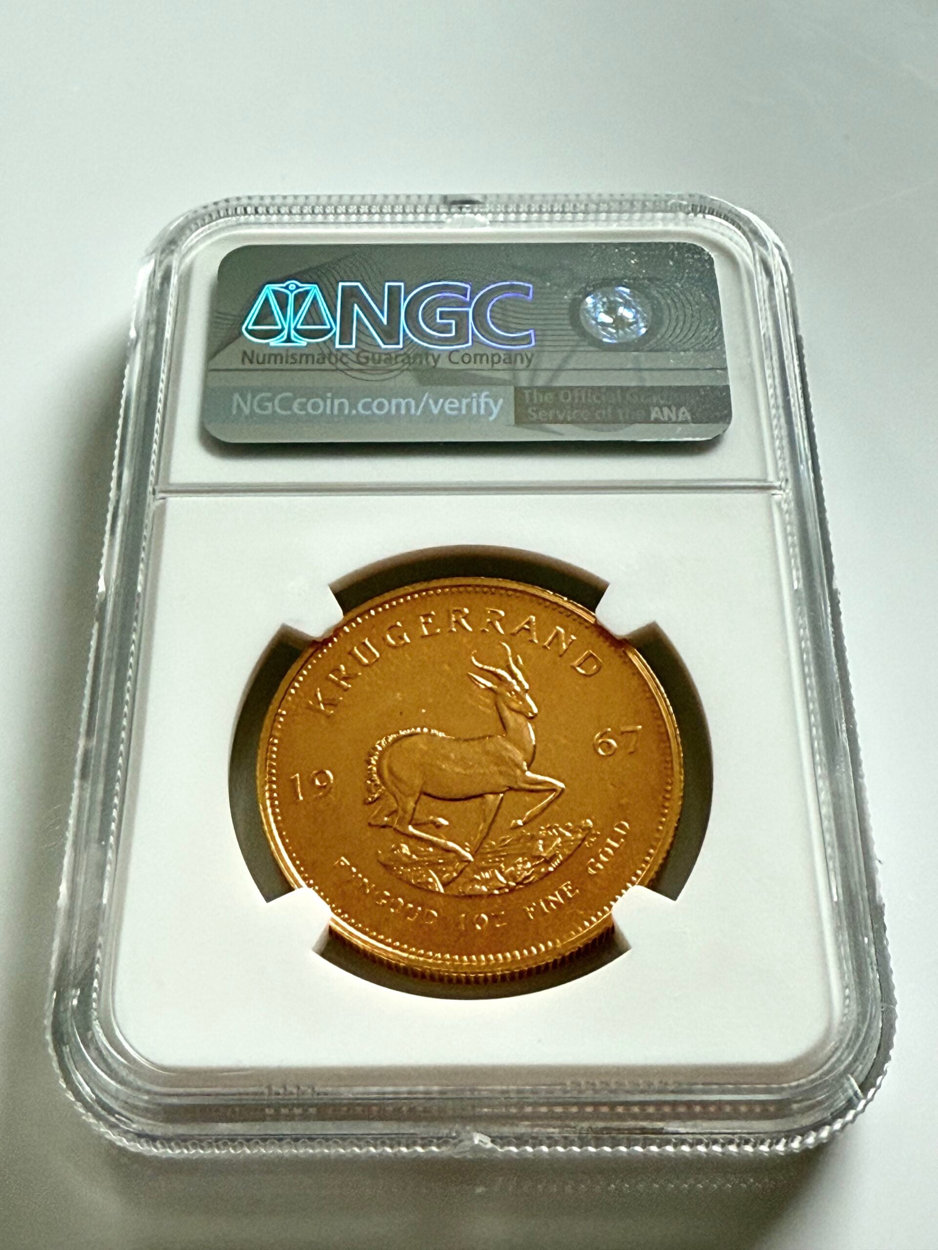 南非1967年克鲁格兰1盎司金质精制品,NGC持有人PF64,正面附保罗·克鲁格肖像,证书8583569-001
