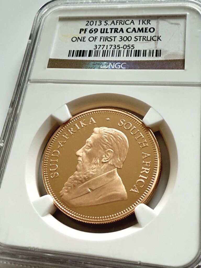 Moneda Krugerrand Proof NGC PF69 Ultra Cameo de 1 oz de oro de Sudáfrica 2013. Una de las primeras 300 acuñadas en soporte NGC con retrato de Kruger.