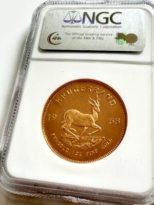 kruegerrand-1968-gold-1oz-ngc-pf66-cameo_2 A historic 1968 Krugerrand (1 oz gold), certified by NGC as PF 66 CAMEO. The label displays the certification number 1914856-024. The portrait of Paul Kruger features the typical "cameo" contrast.