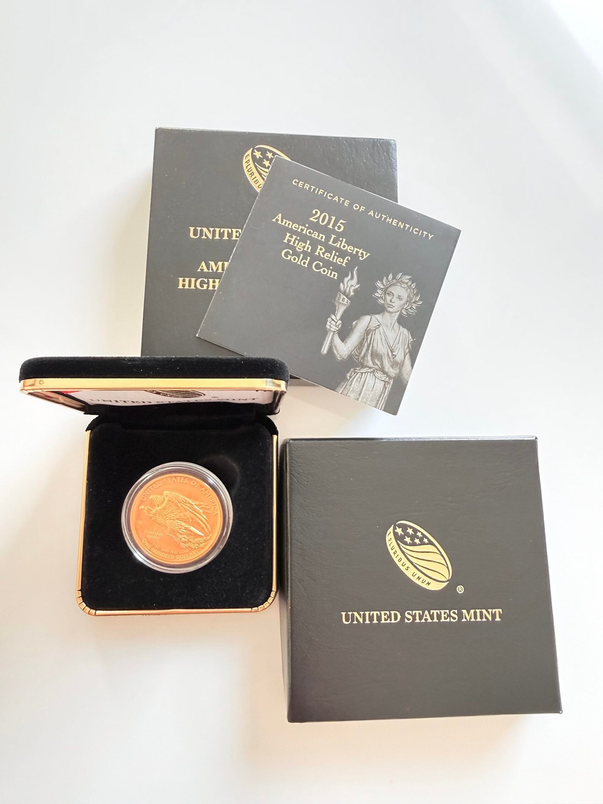 2015 American Liberty High Relief Gold Coin of the United States Mint in opened presentation box with capsule, certificate and original outer packaging.