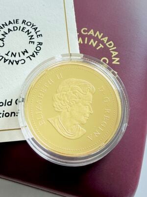 Canadian gold coin from 2014 in capsule with certificate and original box from the Royal Canadian Mint for the Royal Generations issue.