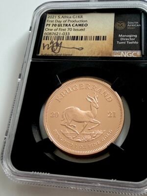 NGC-zertifizierte Krügerrand-Goldmünze aus Südafrika von 2021, First Day of Production, bewertet mit PF70 Ultra Cameo, im NGC-Slab.