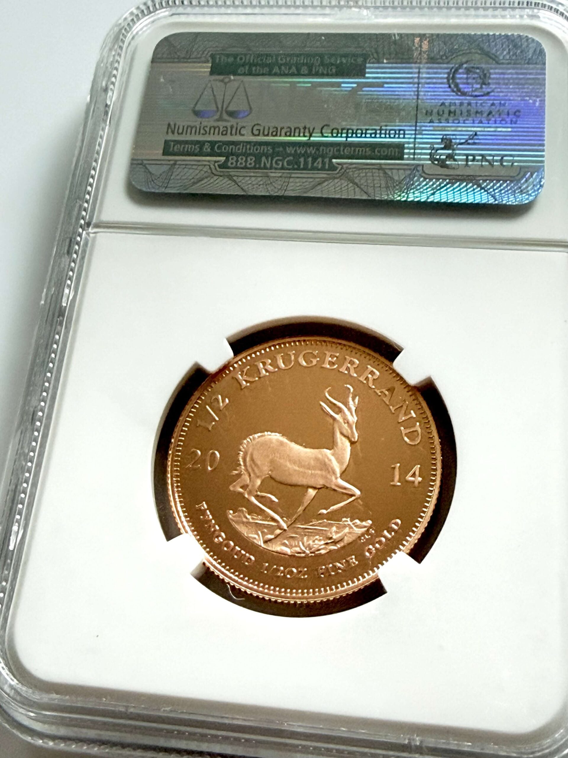 Moneta commemorativa Krugerrand 2014 da 1/2 oz in oro, versione Proof, certificata NGC PF70 Ultra Cameo Top Pop con Springbok.